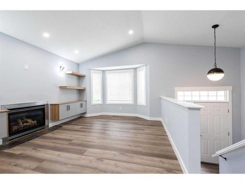 127 Saddlemont Crescent Ne, Calgary, AB - Indoor With Fireplace