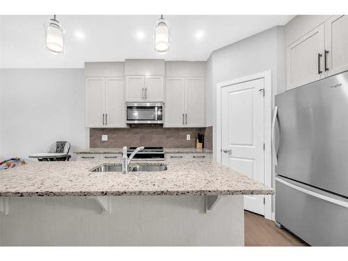 579 Cornerstone Avenue Ne, Calgary, AB - Indoor Photo Showing Kitchen With Double Sink With Upgraded Kitchen