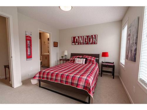 6 Walden Walk Se, Calgary, AB - Indoor Photo Showing Bedroom