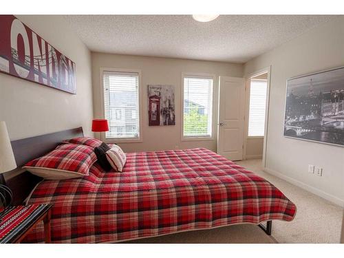 6 Walden Walk Se, Calgary, AB - Indoor Photo Showing Bedroom