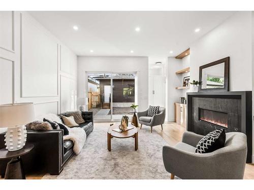 2110 Broadview Road Nw, Calgary, AB - Indoor Photo Showing Living Room With Fireplace