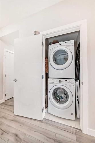 103-24 Sage Hill Terrace Nw, Calgary, AB - Indoor Photo Showing Laundry Room
