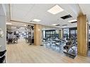 324-255 Les Jardins Park Se, Calgary, AB  - Indoor Photo Showing Gym Room 