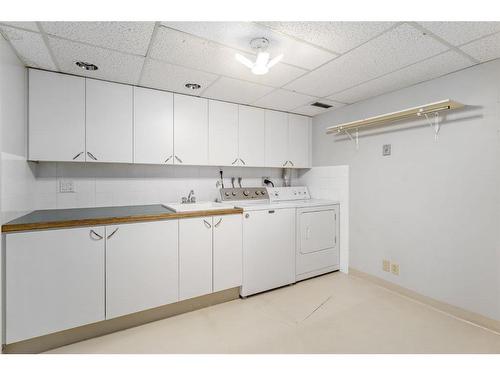 127 Bow Green Crescent Nw, Calgary, AB - Indoor Photo Showing Laundry Room