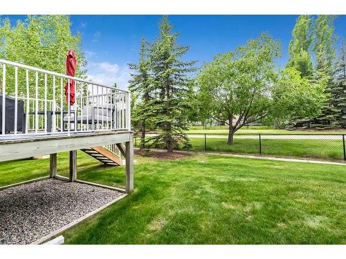 8 Crystal Shores Cove, Okotoks, AB - Outdoor With Deck Patio Veranda