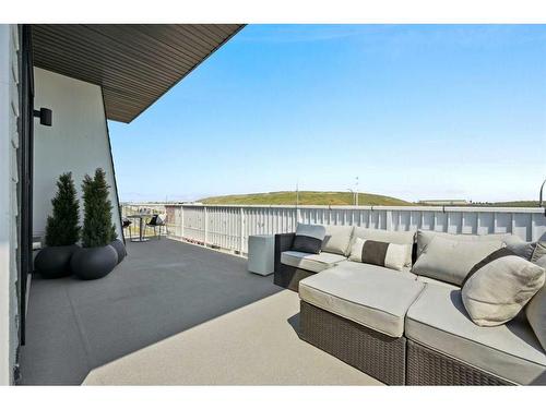 402-255 Les Jardins Park Se, Calgary, AB - Outdoor With Balcony With Exterior