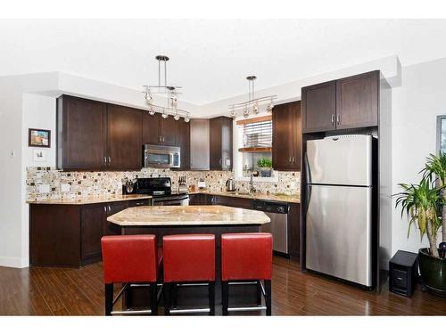 302-3704 15A Street Sw, Calgary, AB - Indoor Photo Showing Kitchen With Double Sink