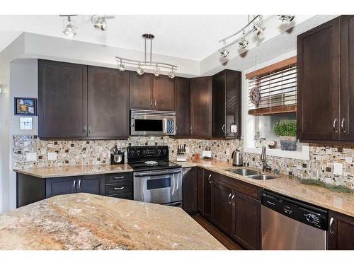302-3704 15A Street Sw, Calgary, AB - Indoor Photo Showing Kitchen With Double Sink