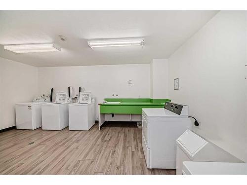 411-3730 50 Street Nw, Calgary, AB - Indoor Photo Showing Laundry Room
