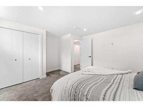 140 Lake Wapta Rise Se, Calgary, AB - Indoor Photo Showing Bedroom