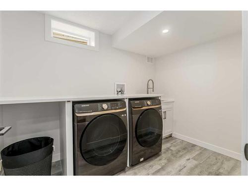 140 Lake Wapta Rise Se, Calgary, AB - Indoor Photo Showing Laundry Room