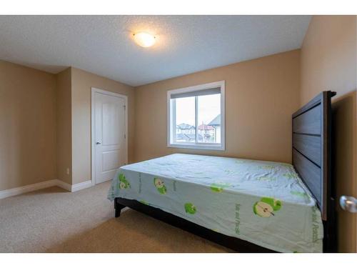 140 Royal Birch Crescent Nw, Calgary, AB - Indoor Photo Showing Bedroom