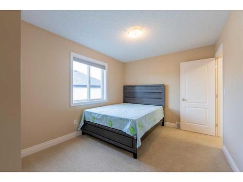 140 Royal Birch Crescent Nw, Calgary, AB - Indoor Photo Showing Bedroom