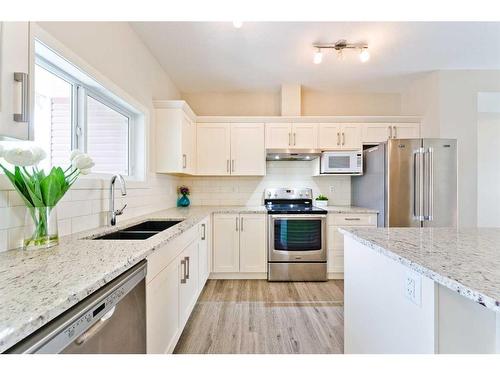 373 Nolancrest Heights Nw, Calgary, AB - Indoor Photo Showing Kitchen With Stainless Steel Kitchen With Double Sink With Upgraded Kitchen