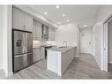 409-255 Les Jardins Park Se, Calgary, AB  - Indoor Photo Showing Kitchen With Stainless Steel Kitchen With Upgraded Kitchen 