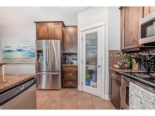 1-1621 27 Avenue Sw, Calgary, AB - Indoor Photo Showing Kitchen With Stainless Steel Kitchen