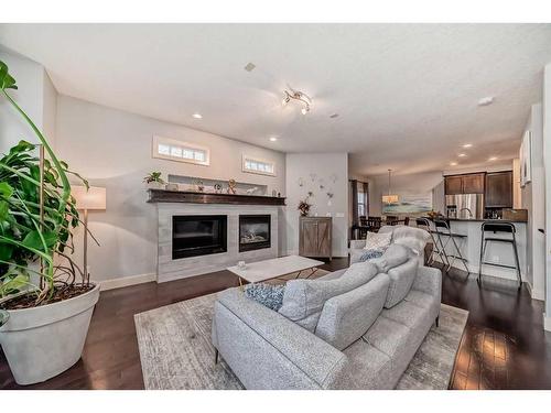 1-1621 27 Avenue Sw, Calgary, AB - Indoor Photo Showing Living Room With Fireplace