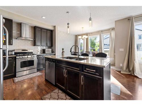 200 Evanswood Circle Nw, Calgary, AB - Indoor Photo Showing Kitchen With Stainless Steel Kitchen With Double Sink With Upgraded Kitchen