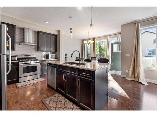 200 Evanswood Circle Nw, Calgary, AB - Indoor Photo Showing Kitchen With Stainless Steel Kitchen With Double Sink With Upgraded Kitchen