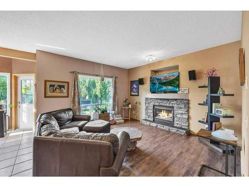 238 Valley Glen Bay Nw, Calgary, AB - Indoor Photo Showing Living Room With Fireplace