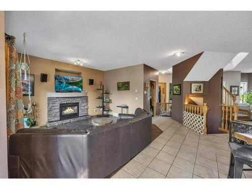 238 Valley Glen Bay Nw, Calgary, AB - Indoor With Fireplace