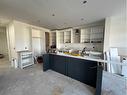 51 Heritage Circle, Cochrane, AB  - Indoor Photo Showing Kitchen 