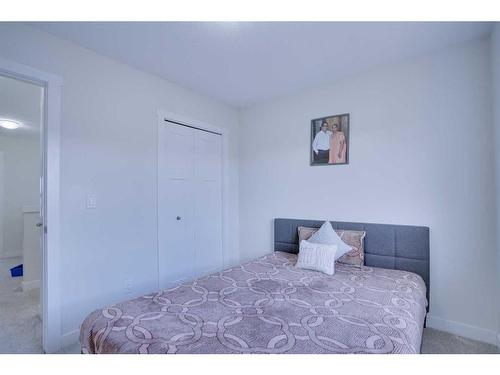 408 South Point Glen Sw, Airdrie, AB - Indoor Photo Showing Bedroom