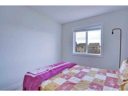 408 South Point Glen Sw, Airdrie, AB - Indoor Photo Showing Bedroom