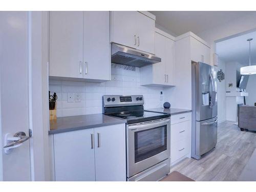 408 South Point Glen Sw, Airdrie, AB - Indoor Photo Showing Kitchen