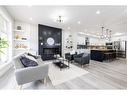 148 Saddlelake Manor Ne, Calgary, AB  - Indoor Photo Showing Living Room With Fireplace 