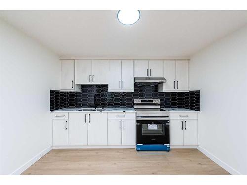 148 Saddlelake Manor Ne, Calgary, AB - Indoor Photo Showing Kitchen