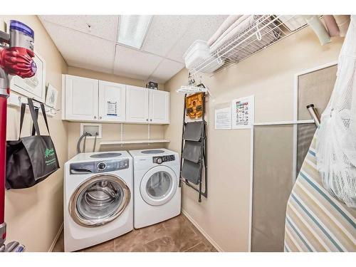 251-223 Tuscany Springs Boulevard Nw, Calgary, AB - Indoor Photo Showing Laundry Room