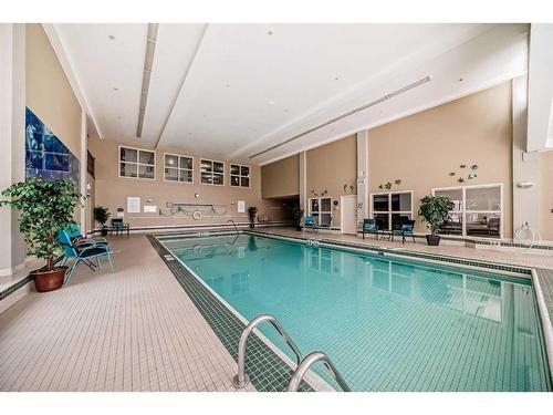 251-223 Tuscany Springs Boulevard Nw, Calgary, AB - Indoor Photo Showing Other Room With In Ground Pool