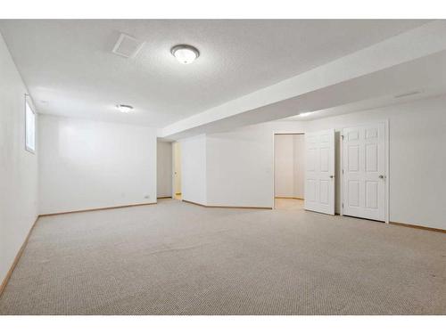50 Prestwick Pond Terrace Se, Calgary, AB - Indoor Photo Showing Other Room