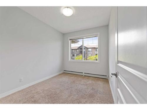 308-76 Panatella Road Nw, Calgary, AB - Indoor Photo Showing Other Room