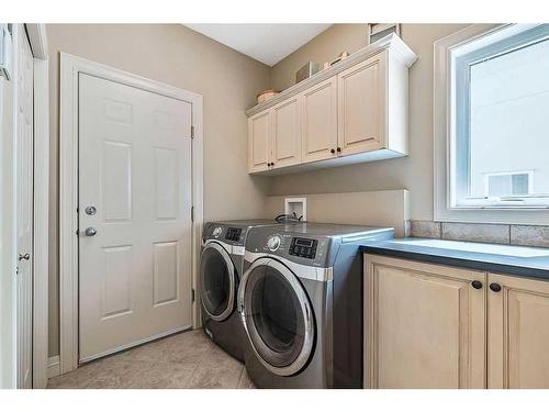 27 Discovery Drive Sw, Calgary, AB - Indoor Photo Showing Laundry Room