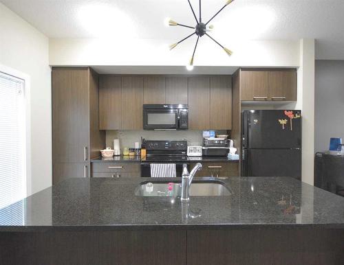 327 Taralake Way Ne, Calgary, AB - Indoor Photo Showing Kitchen With Double Sink