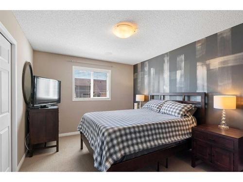 69 Bridleridge View Sw, Calgary, AB - Indoor Photo Showing Bedroom