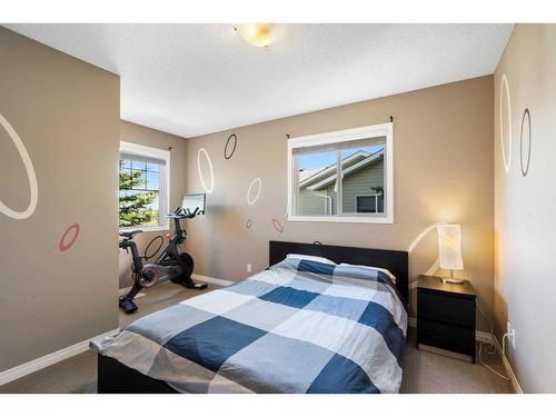 69 Bridleridge View Sw, Calgary, AB - Indoor Photo Showing Bedroom