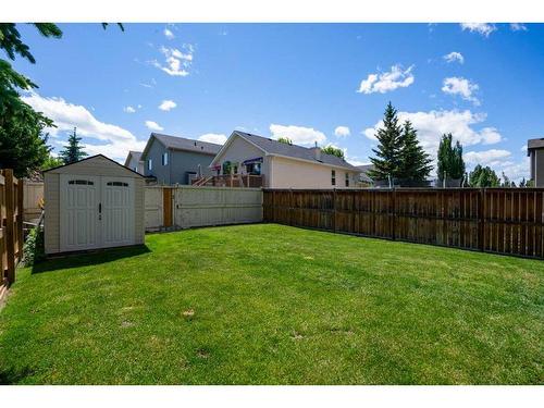 69 Bridleridge View Sw, Calgary, AB - Outdoor With Backyard