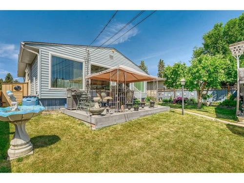 56 Huntwick Way Ne, Calgary, AB - Outdoor With Deck Patio Veranda