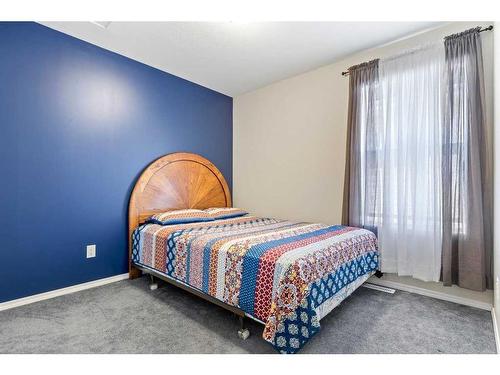 10 Lodge Place, Sylvan Lake, AB - Indoor Photo Showing Bedroom