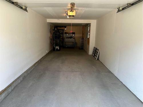 810 Mckenzie Towne Common Se, Calgary, AB - Indoor Photo Showing Garage