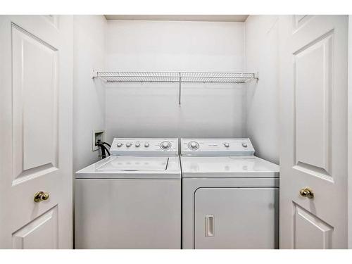 126 Douglasview Rise Se, Calgary, AB - Indoor Photo Showing Laundry Room