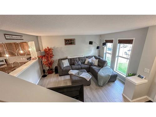 153 Elgin Meadows View Se, Calgary, AB - Indoor Photo Showing Living Room