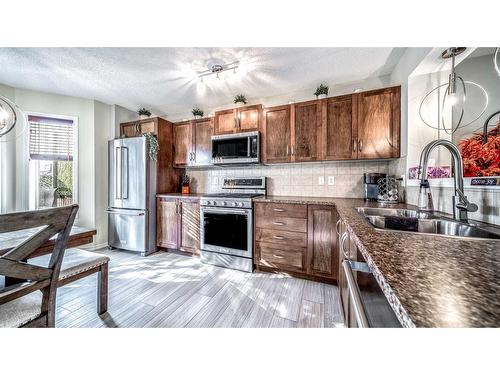 153 Elgin Meadows View Se, Calgary, AB - Indoor Photo Showing Kitchen With Double Sink