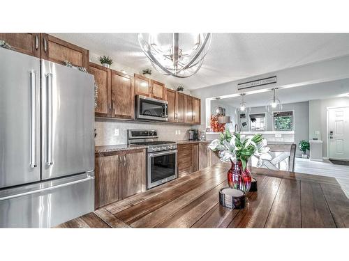 153 Elgin Meadows View Se, Calgary, AB - Indoor Photo Showing Kitchen With Stainless Steel Kitchen