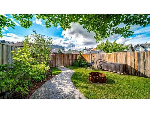 153 Elgin Meadows View Se, Calgary, AB - Outdoor With Backyard