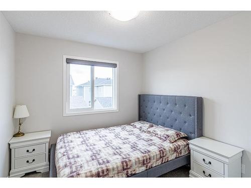 14 Yorkstone Walk Sw, Calgary, AB - Indoor Photo Showing Bedroom