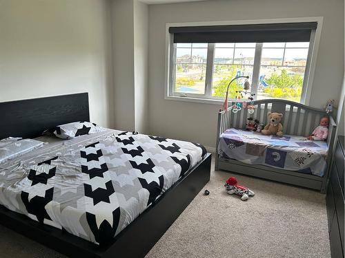 14 Yorkstone Walk Sw, Calgary, AB - Indoor Photo Showing Bedroom